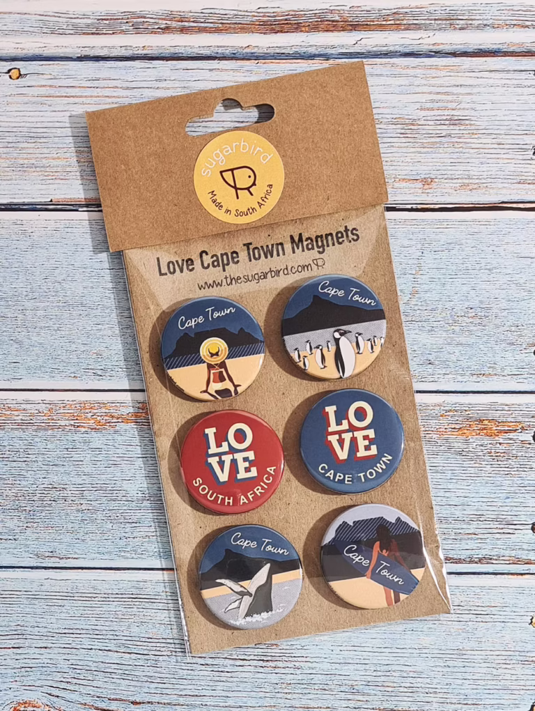 Cape Town magnets, fridge magnets, souvenir magnets, South Africa gifts, Cape Town souvenirs, travel magnets, decorative magnets, home décor, kitchen magnets, magnetic art, Table Mountain, Boulders Beach penguins, whale magnets, Cape Town icons, South African art, local artisan, Sugarbird, ceramic magnets, gift set, tourist souvenirs, Mother City, hand-illustrated, vibrant magnets, sustainable gifts, made in South Africa, refrigerator décor, collectible magnets